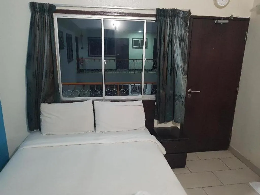 Bed in Hotel Grand Mutiara