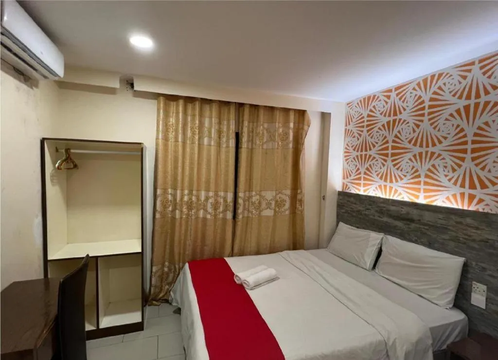 Bed in Hotel Grand Mutiara