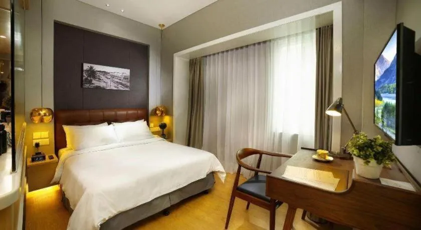 Bed in Kingwood Boutique Hotel