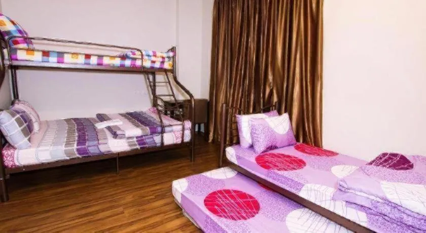 Bed in Tropicana Boutique Hotel