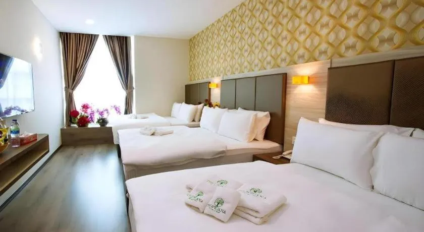 Bed in Tropicana Boutique Hotel