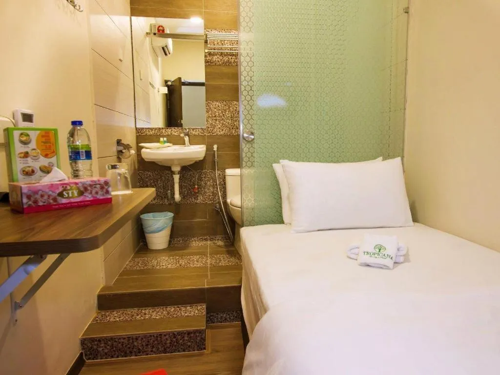 Bed in Tropicana Boutique Hotel