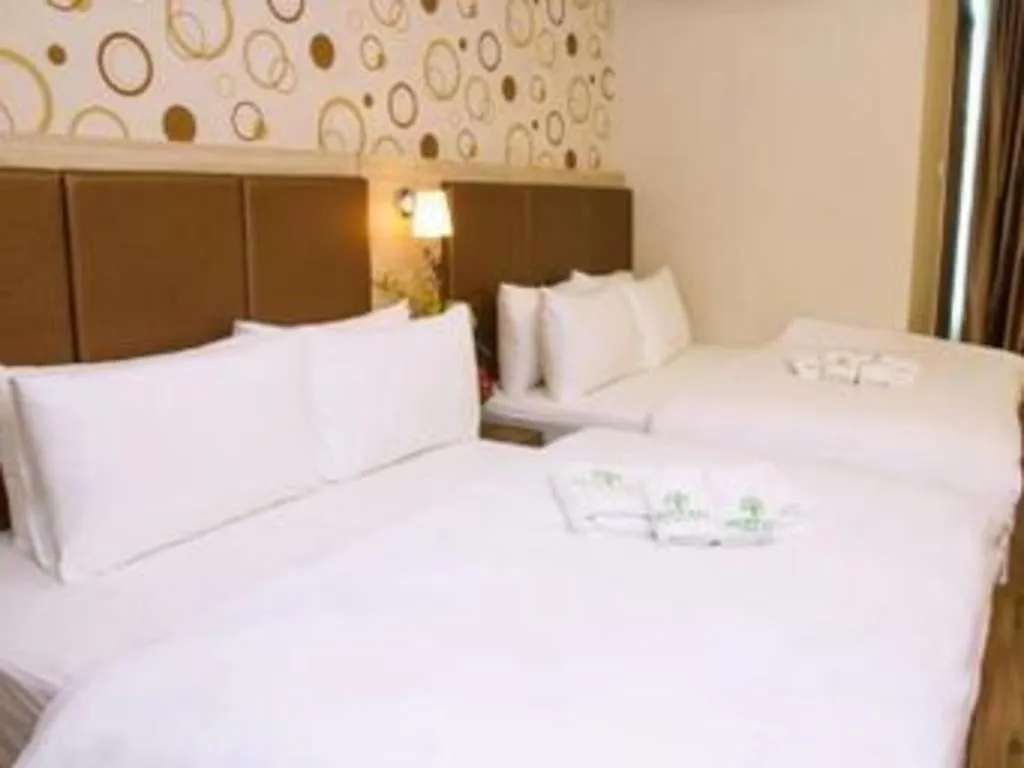 Bed in Tropicana Boutique Hotel