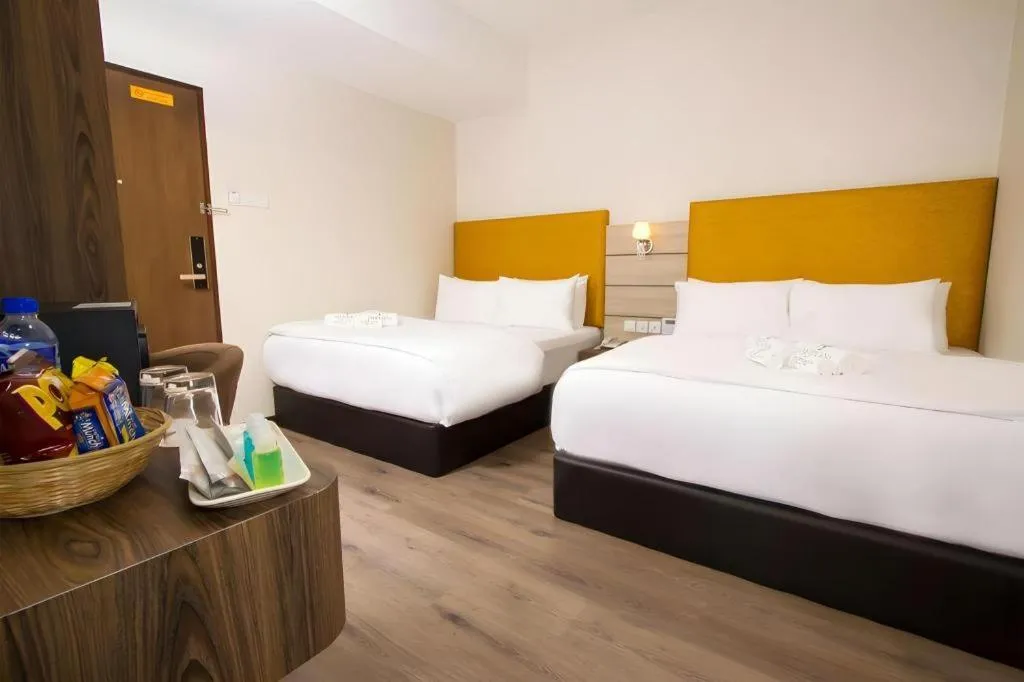 Bed in Tropicana Boutique Hotel