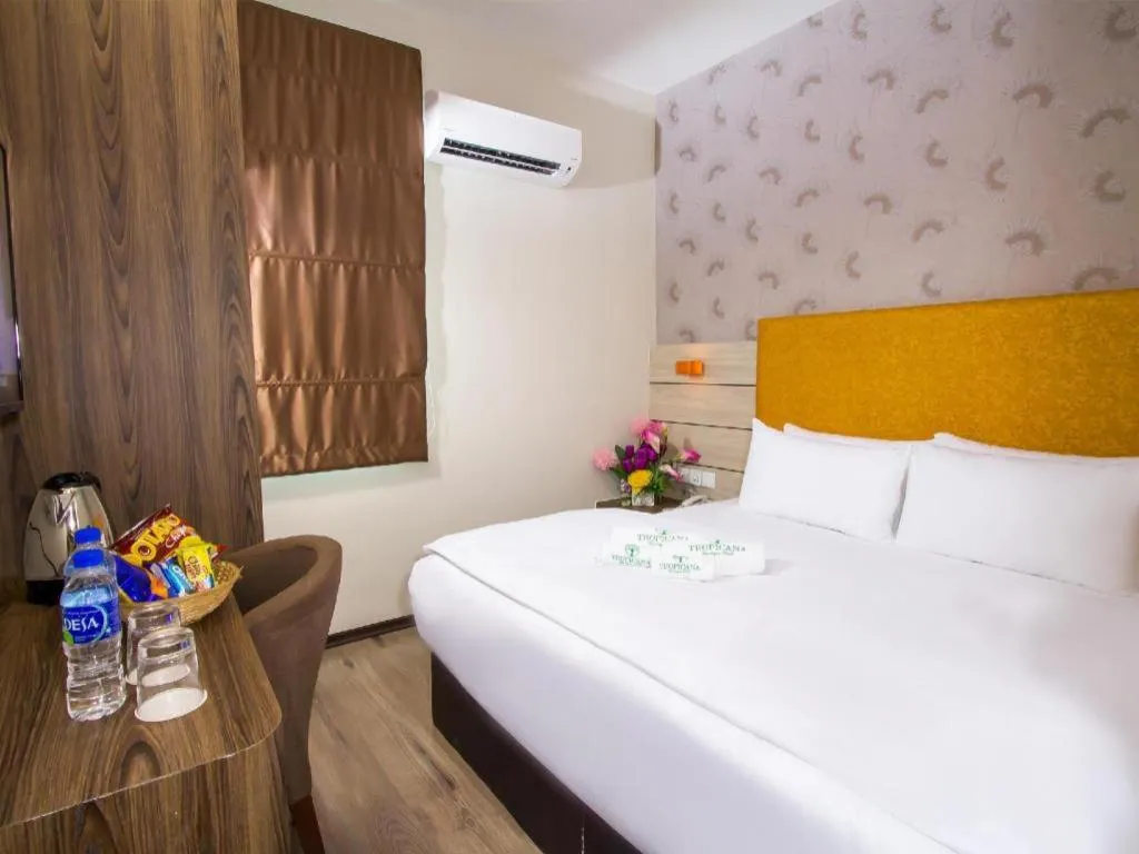 Bed in Tropicana Boutique Hotel