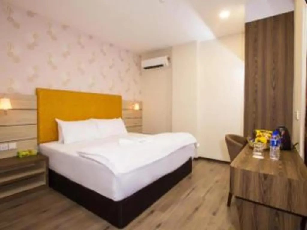 Bed in Tropicana Boutique Hotel