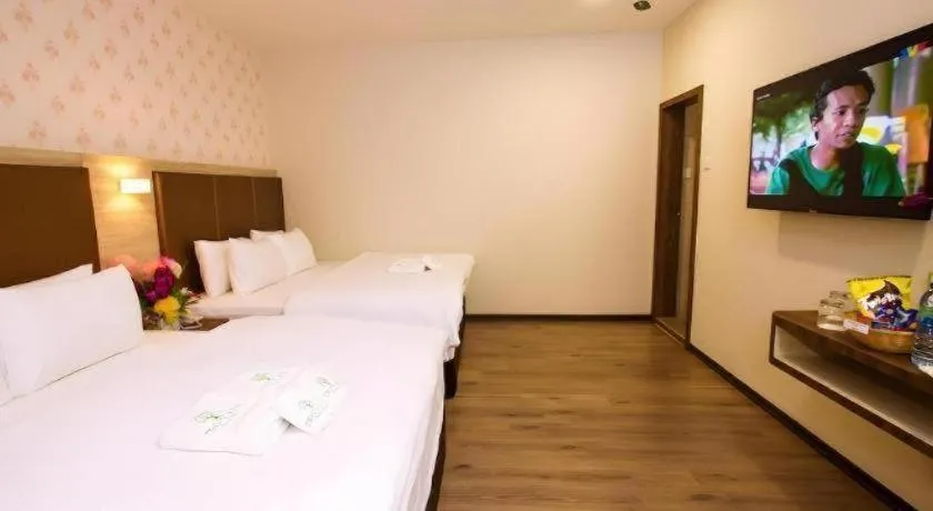 Bed in Tropicana Boutique Hotel