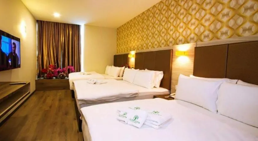 Bed in Tropicana Boutique Hotel