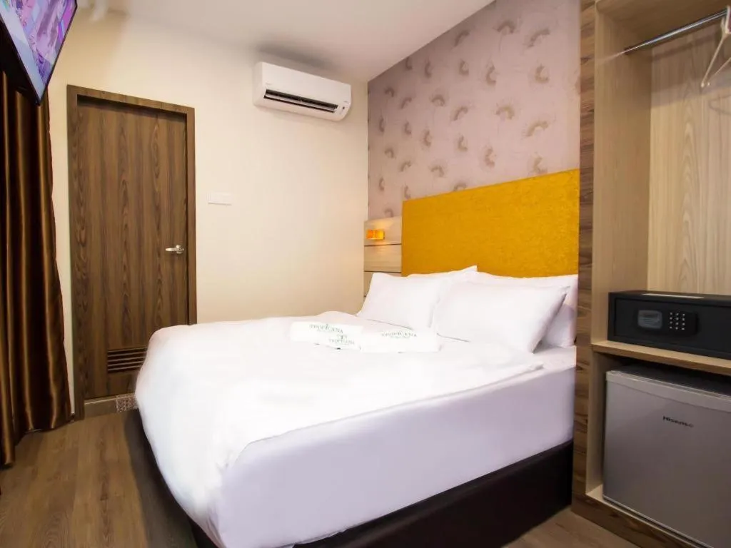 Bed in Tropicana Boutique Hotel