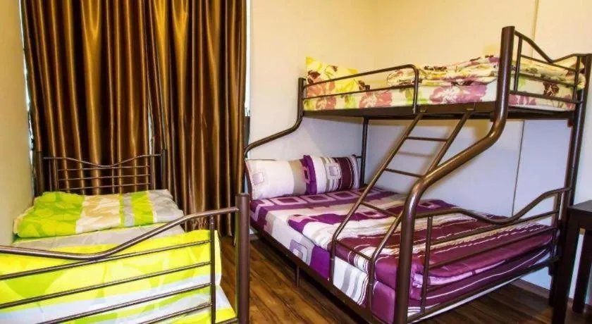 Bed in Tropicana Boutique Hotel