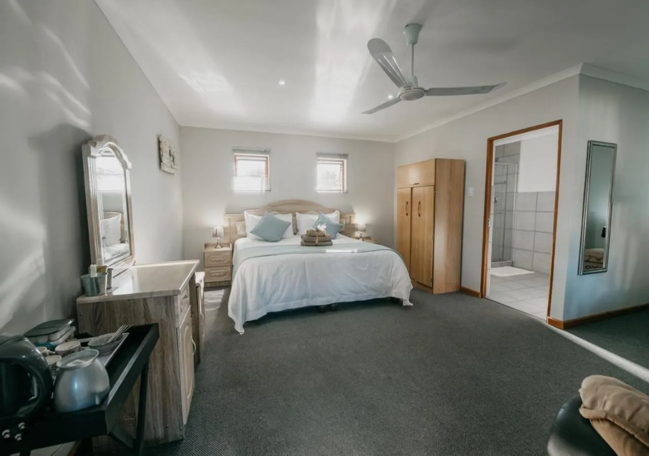 Photo of the whole room, Bed in The Village Lodge