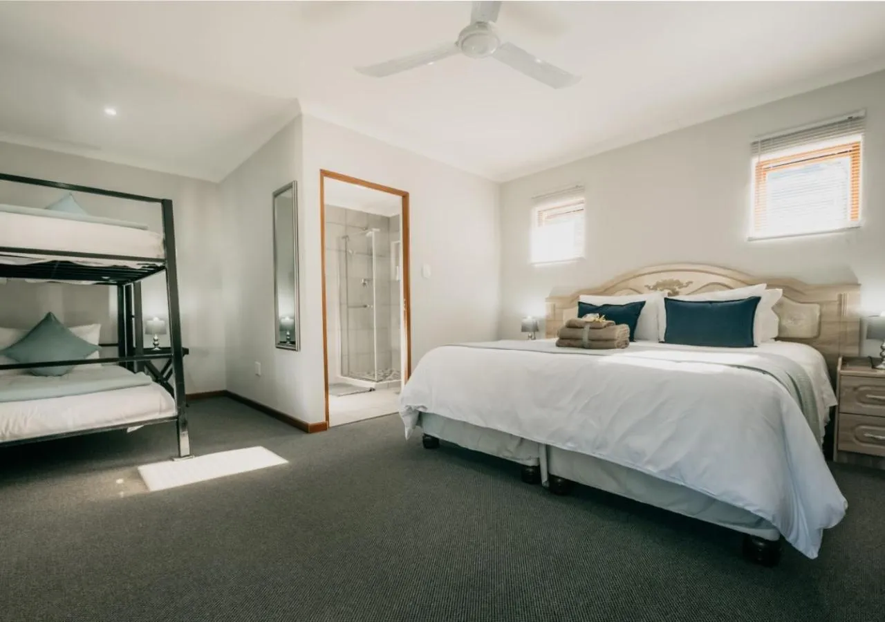Photo of the whole room, Bed in The Village Lodge