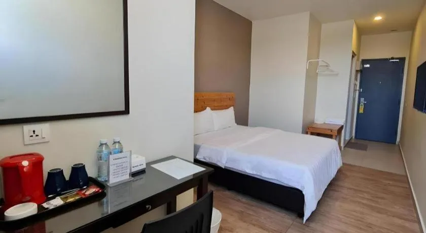 Bed in Sg. Paka Hotel