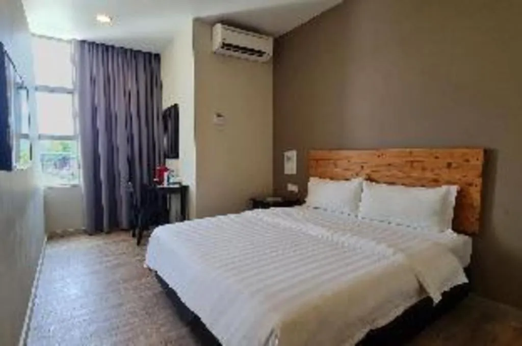 Bed in Sg. Paka Hotel