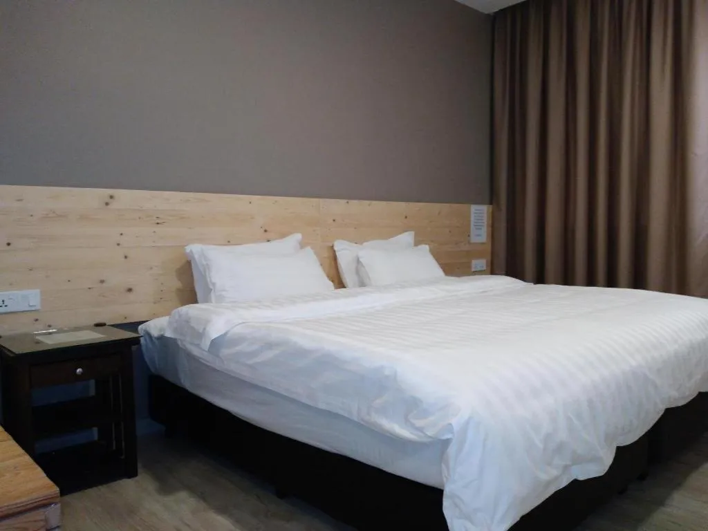 Bed in Sg. Paka Hotel