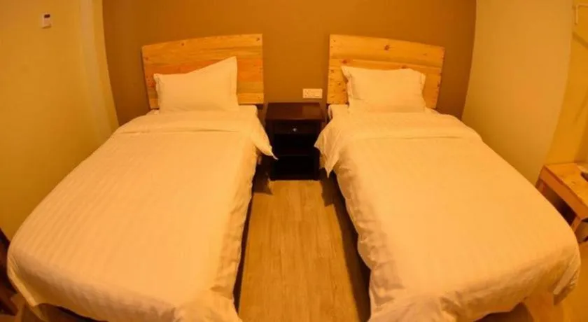 Bed in Sg. Paka Hotel