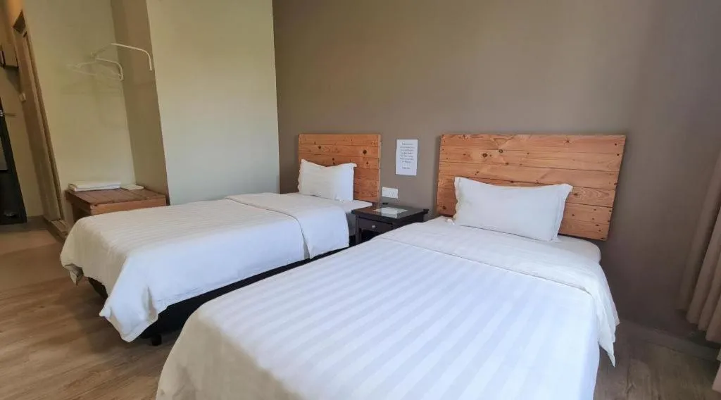 Bed in Sg. Paka Hotel