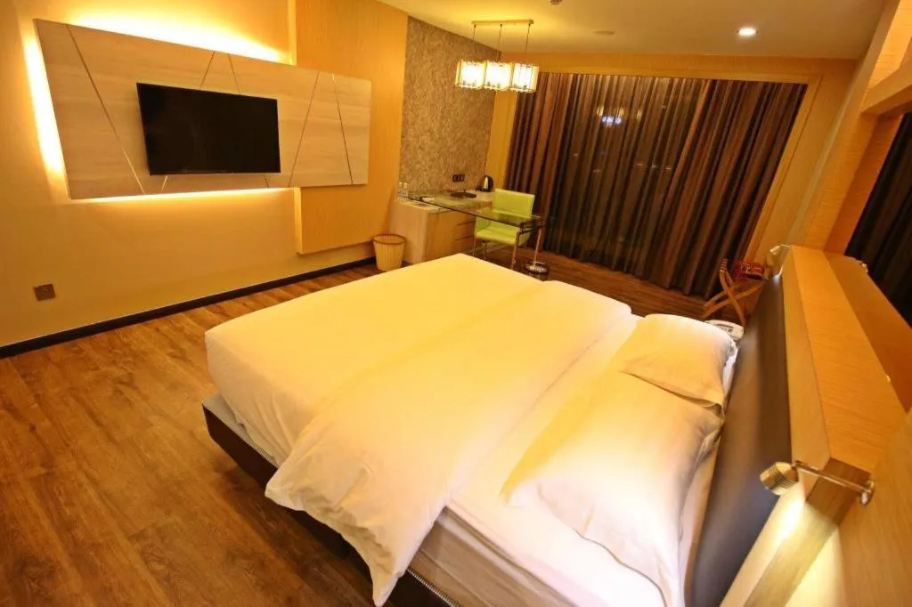 Bed in JC Mark Hotel