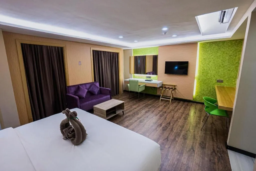 Bed in JC Mark Hotel