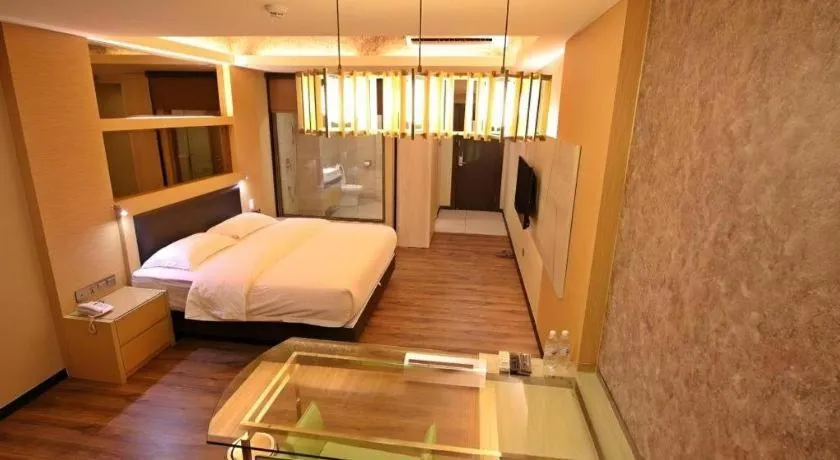 Bed in JC Mark Hotel