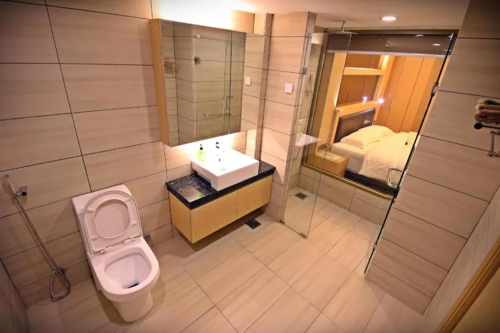 Bed in JC Mark Hotel