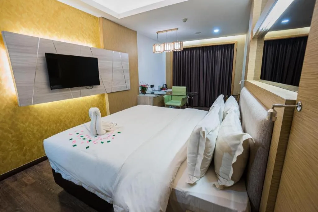 Bed in JC Mark Hotel