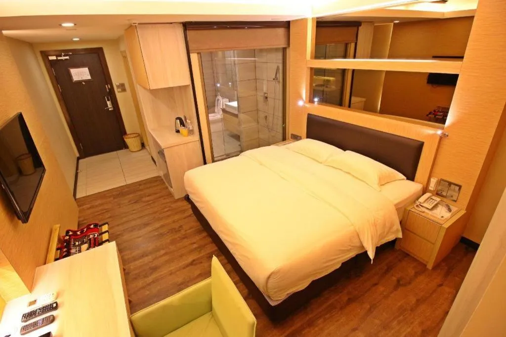 Bed in JC Mark Hotel