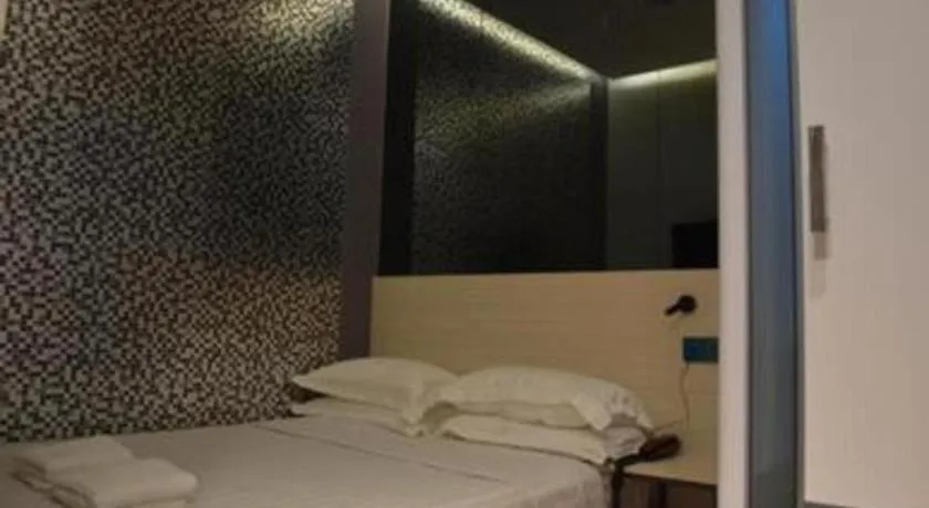 Bed in Laman Green The Boutique Hotel