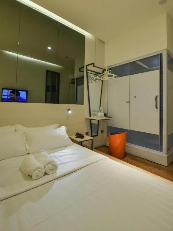 Bed in Laman Green The Boutique Hotel