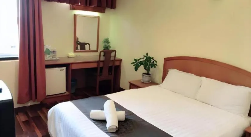 Bed in Global Hotel Labuan