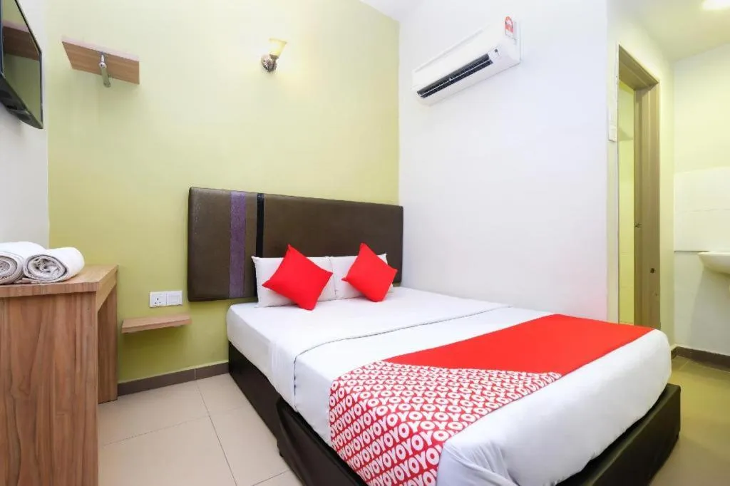 Bed in OYO 90553 Hotel 24 Seven