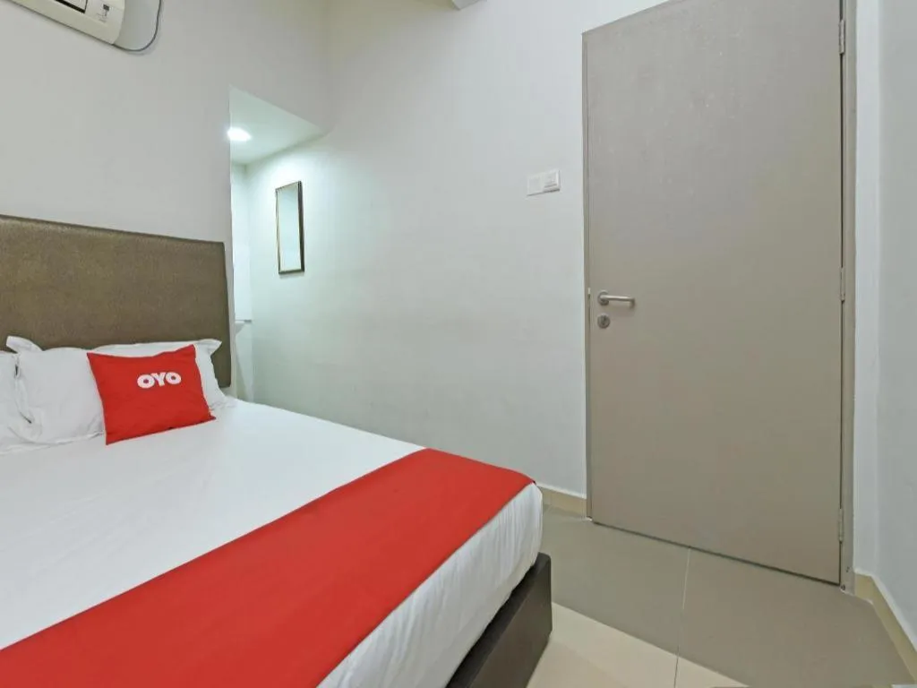 Bed in OYO 90553 Hotel 24 Seven