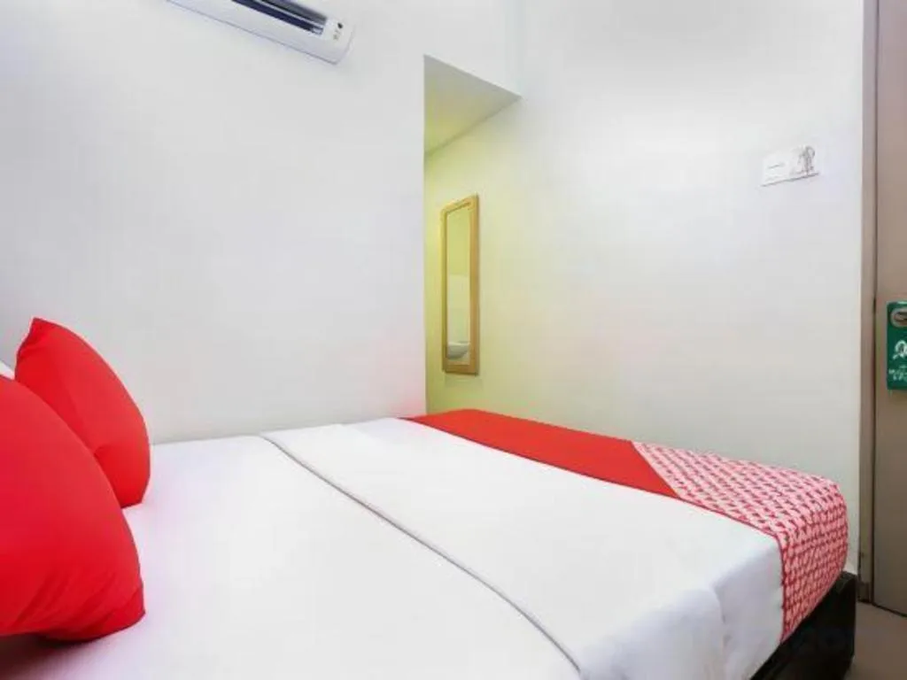 Bed in OYO 90553 Hotel 24 Seven