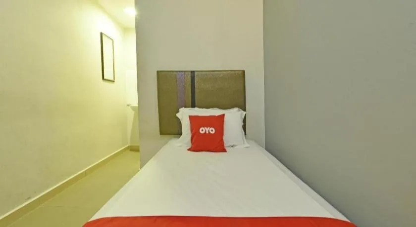 Bed in OYO 90553 Hotel 24 Seven