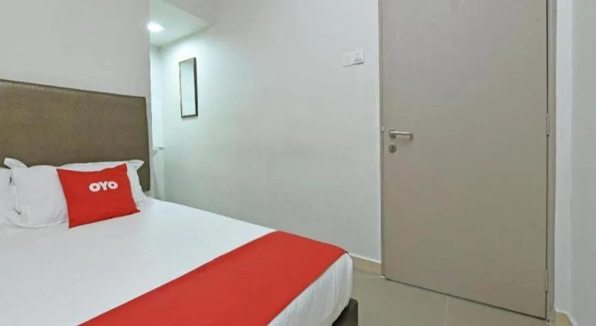 Bed in OYO 90553 Hotel 24 Seven