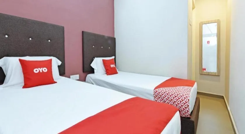 Bed in Capital O 90556 Hotel Cherita Rooms