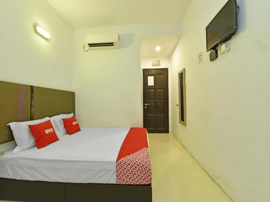 Bed in Capital O 90556 Hotel Cherita Rooms