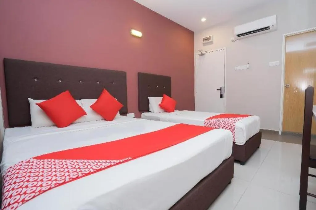 Bed in Capital O 90556 Hotel Cherita Rooms