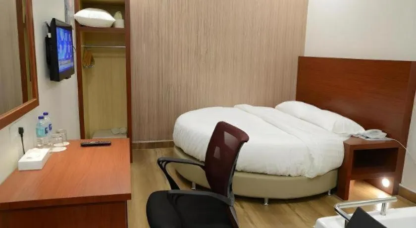 Bed in Elegant Hotel