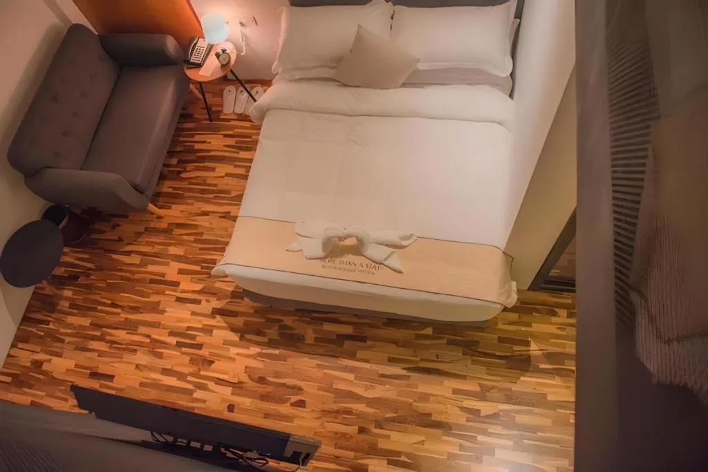 Bed in Muo Boutique Hotel