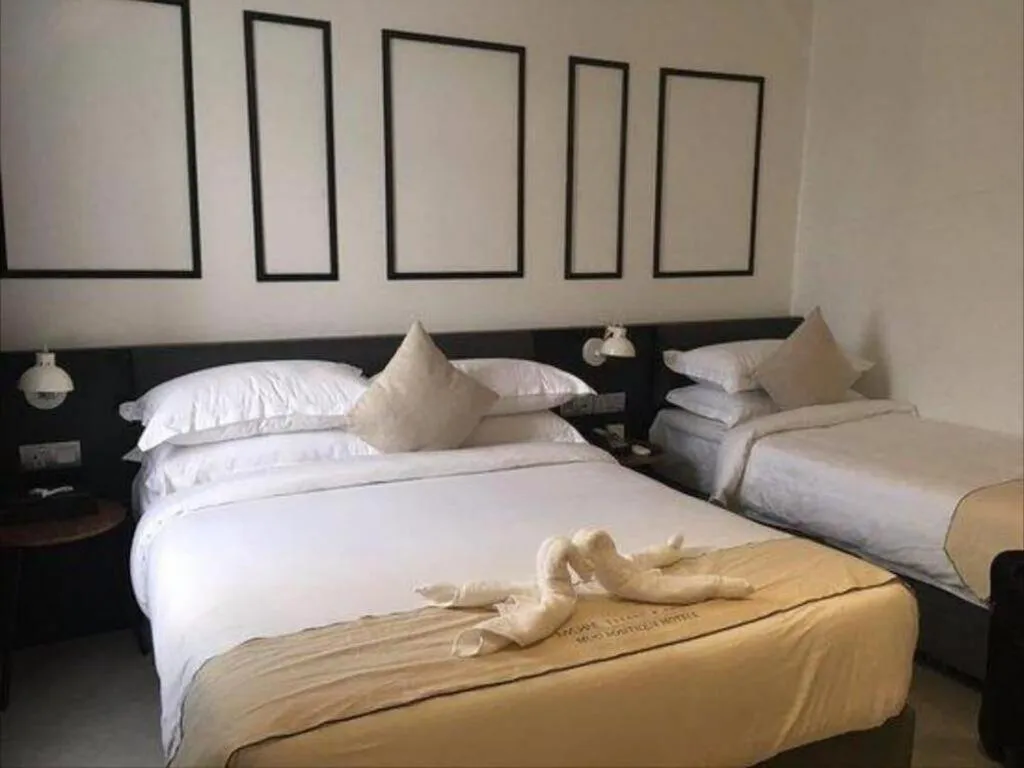 Bed in Muo Boutique Hotel