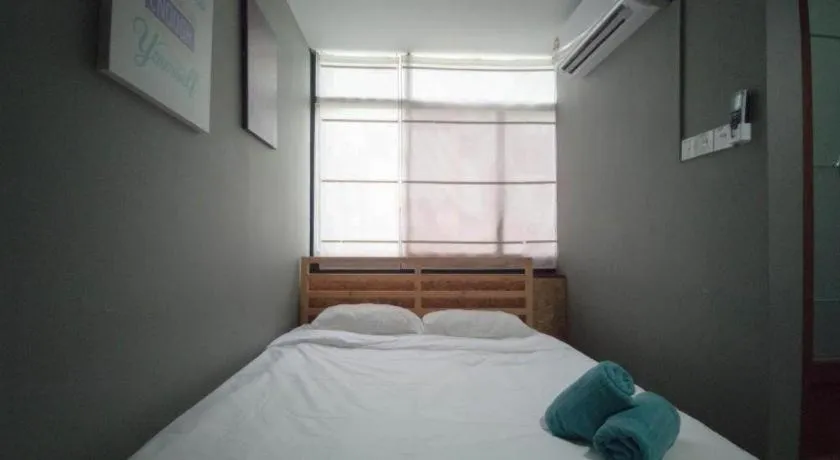 Bed in Koptel Budget Hotel