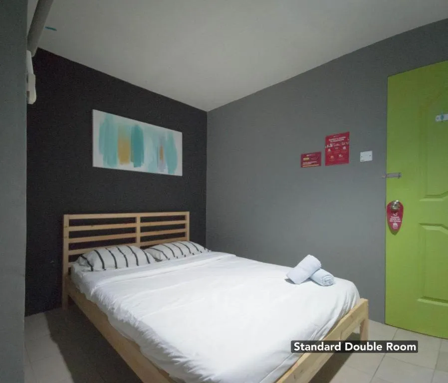 Bed in Koptel Budget Hotel