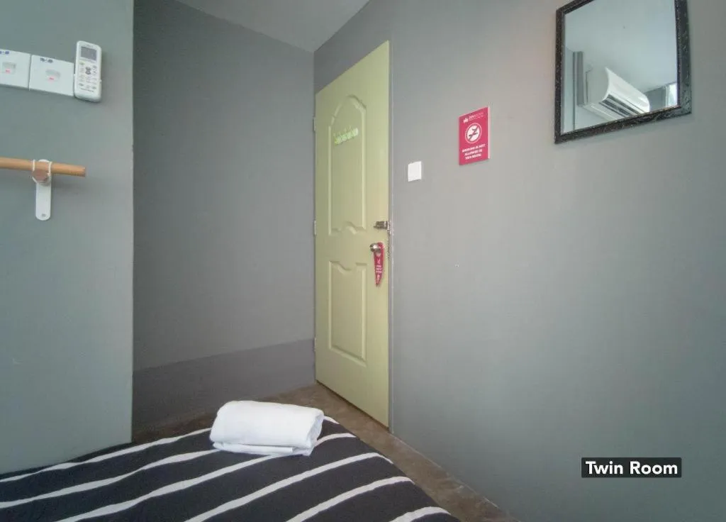 Bed in Koptel Budget Hotel