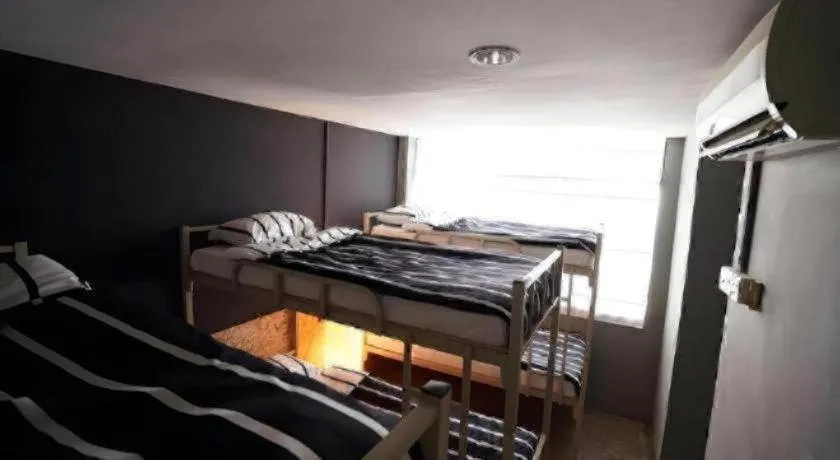 Bed in Koptel Budget Hotel