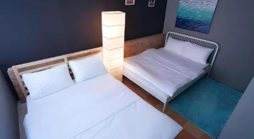 Bed in Koptel Budget Hotel