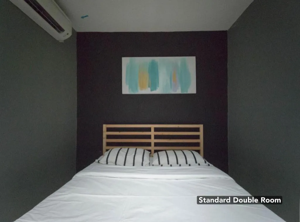 Bed in Koptel Budget Hotel