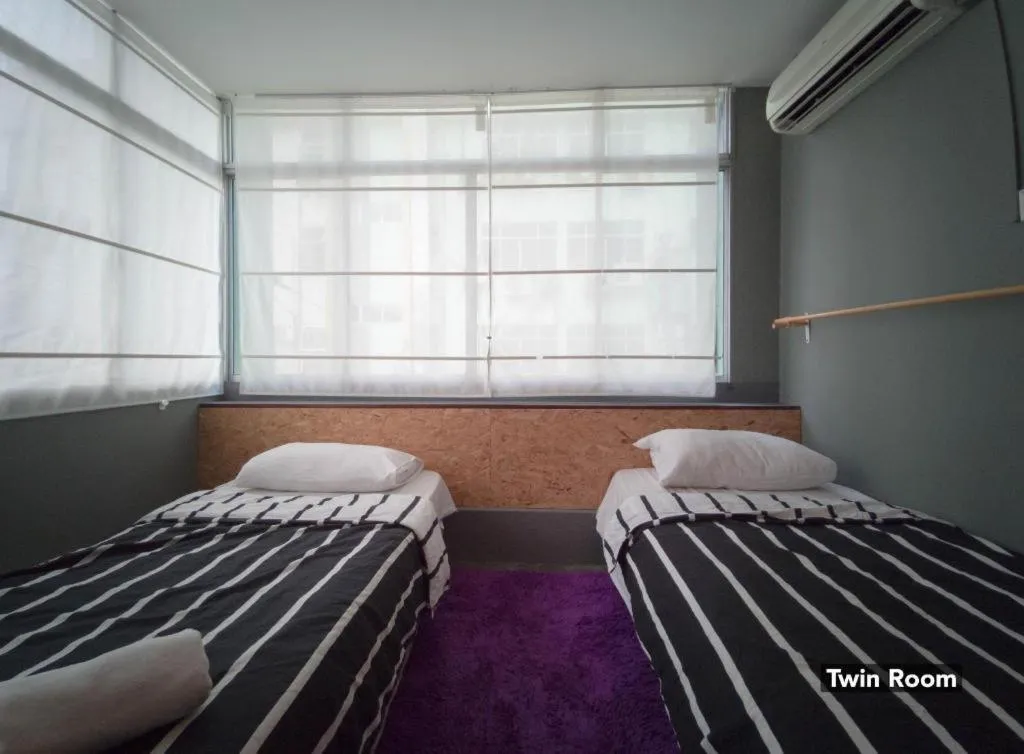 Bed in Koptel Budget Hotel