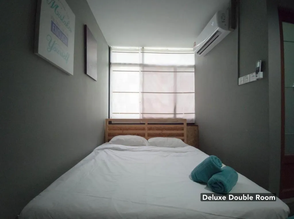 Bed in Koptel Budget Hotel