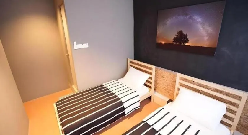 Bed in Koptel Budget Hotel
